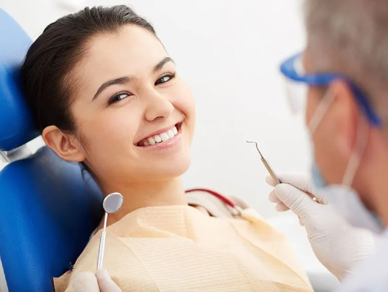 What are the signs of gum disease, and how can it be treated?